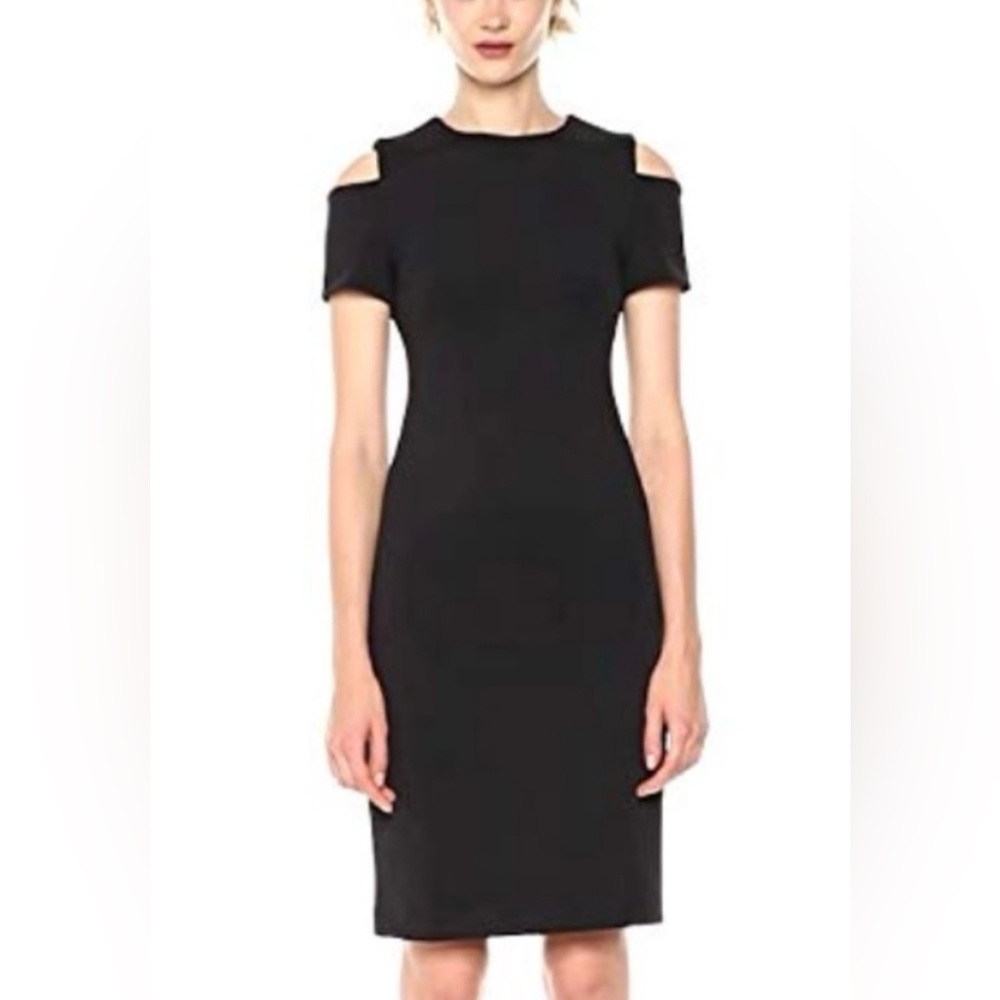 Calvin Klein black short sleeve cold shoulder dress.  EUC